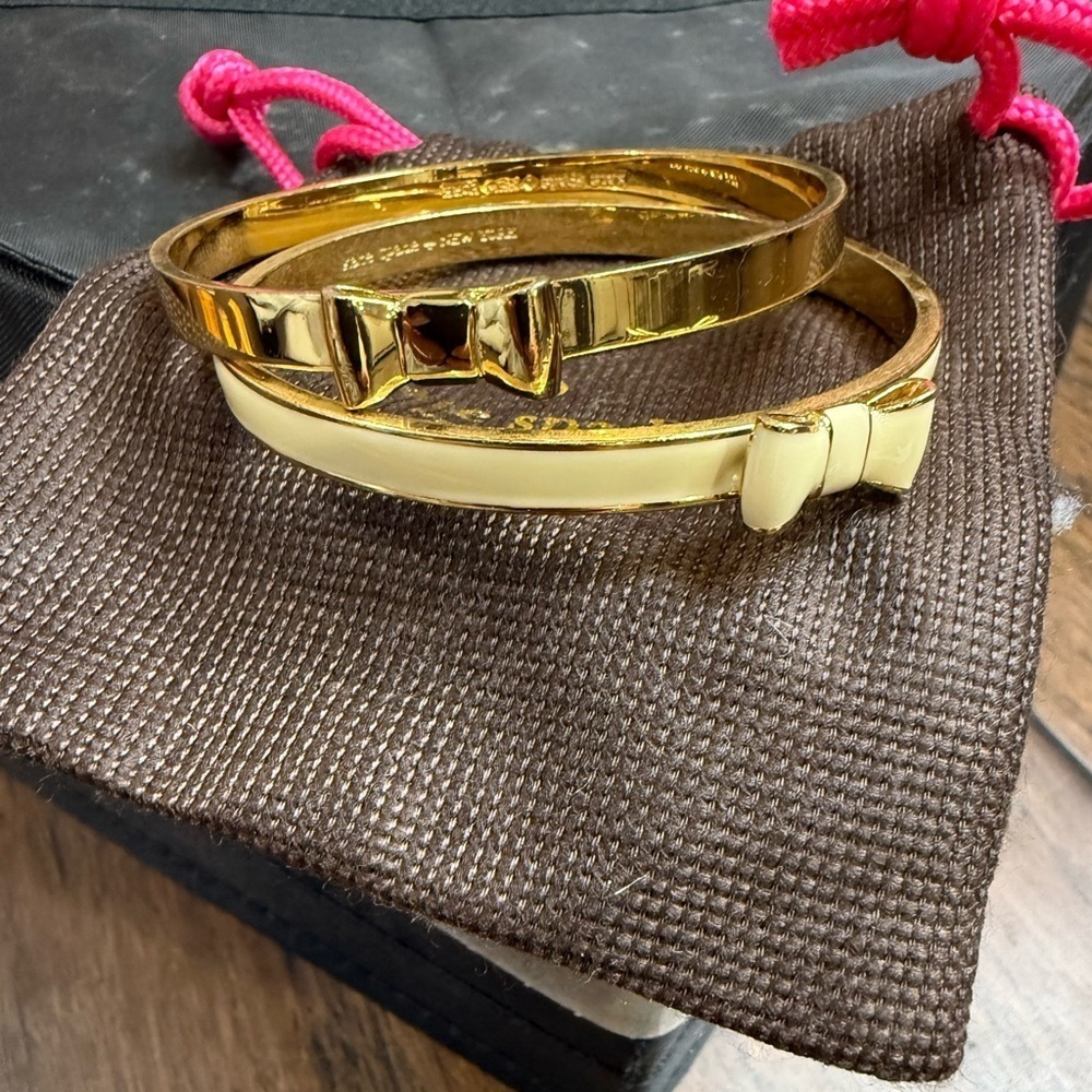Kate Spade Gold and Cream Bow Bangles 2 stacking bracelets